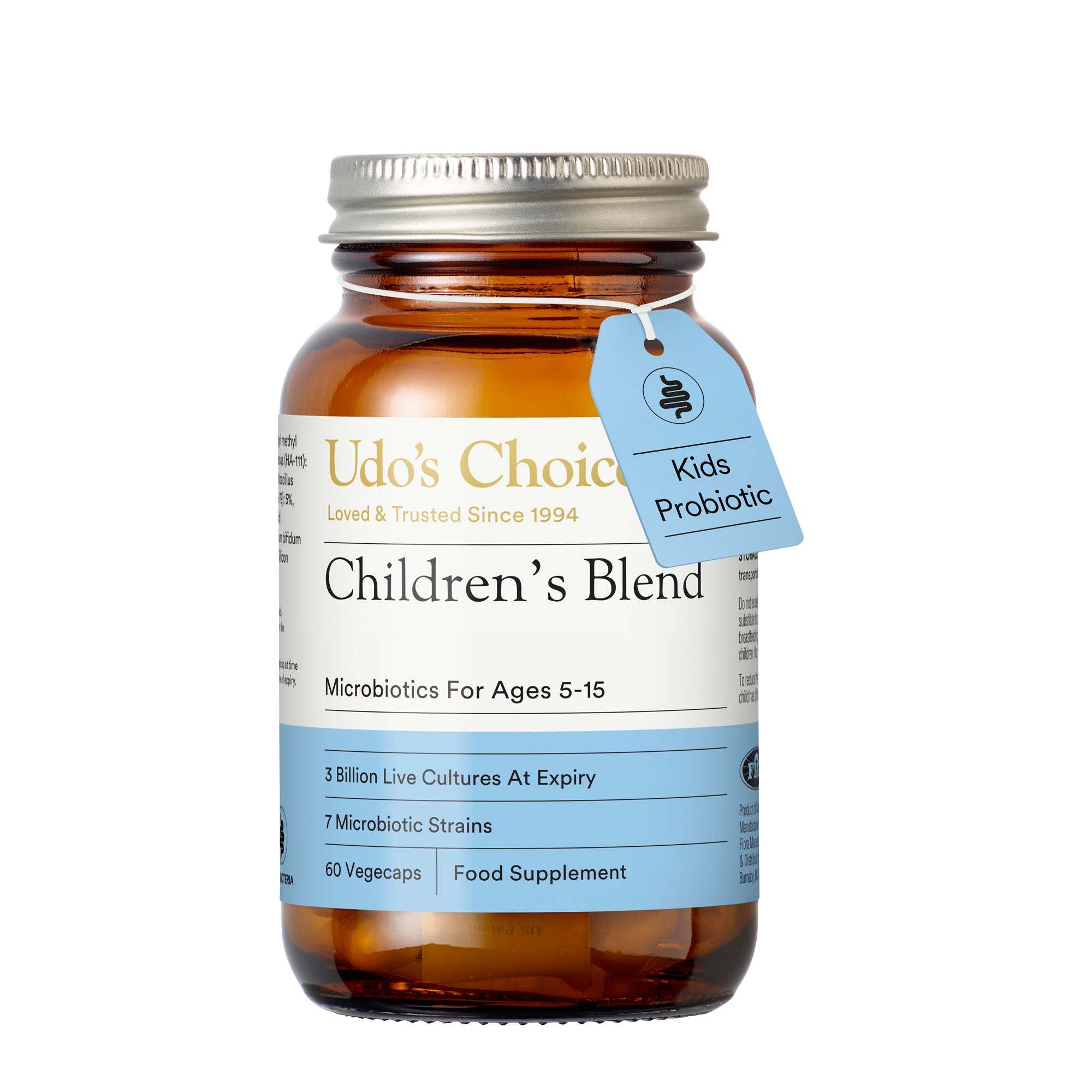Udo's Choice Children's Blend probiotic supplement in an amber glass bottle with a silver metal cap and a blue hanging tag that reads 'Kids Probiotic'.